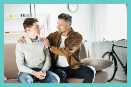 Progress in therapy - a father and son sitting together happy since the son is progressing in therapy